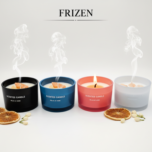 Four scented candles in black, blue, red, and gray with 'FRIZEN' branding on a white background.